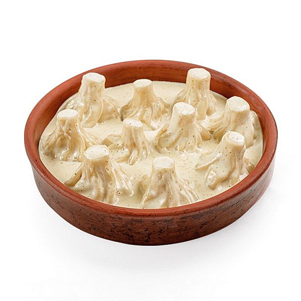 Мини хинкали с курицей в сырном соусе