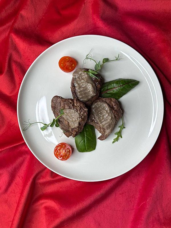 Медальоны в грибном соусе