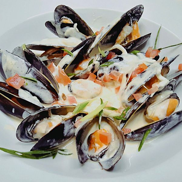 Мидии в винном соусе