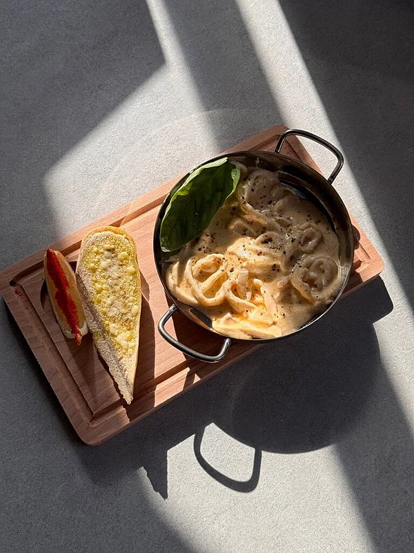 Кальмары в соусе