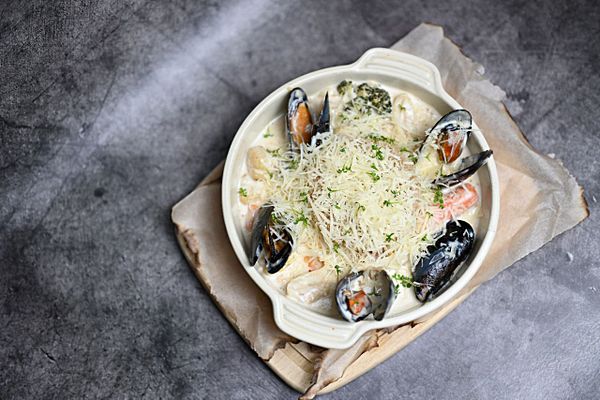 Соте из морепродуктов с киноа в соусе шампань