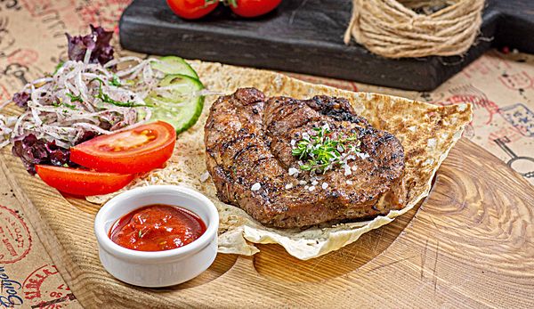 Стейк из свиной шеи