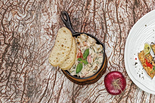 Рапаны в сливочном соусе