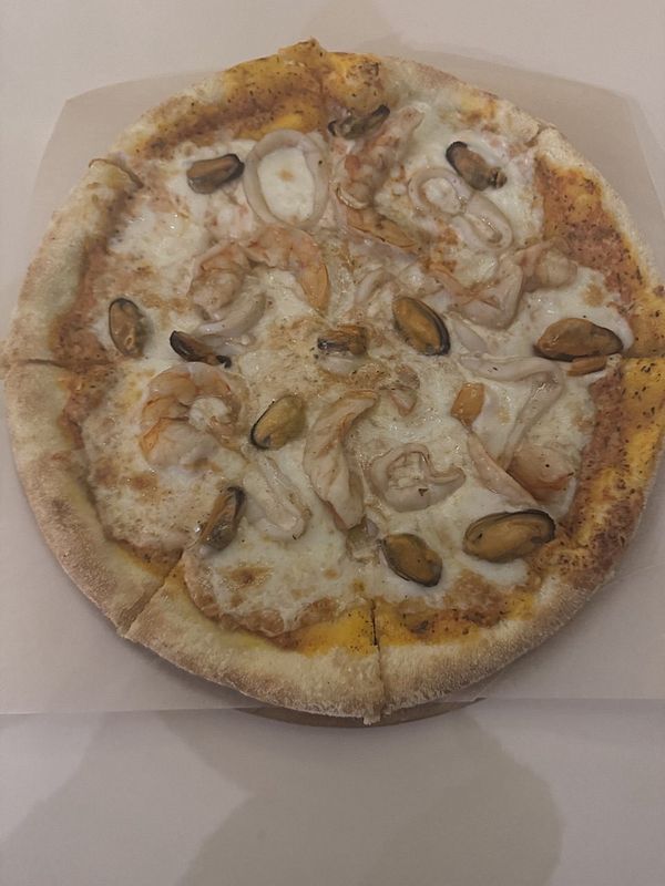 Пицца с морепродуктами