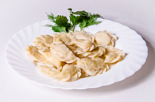 Вареники с капустой и томатами