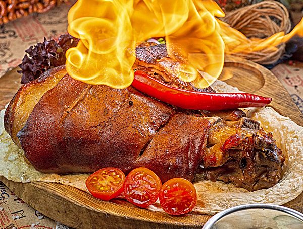 Рулька свиная запечённая в темном пиве