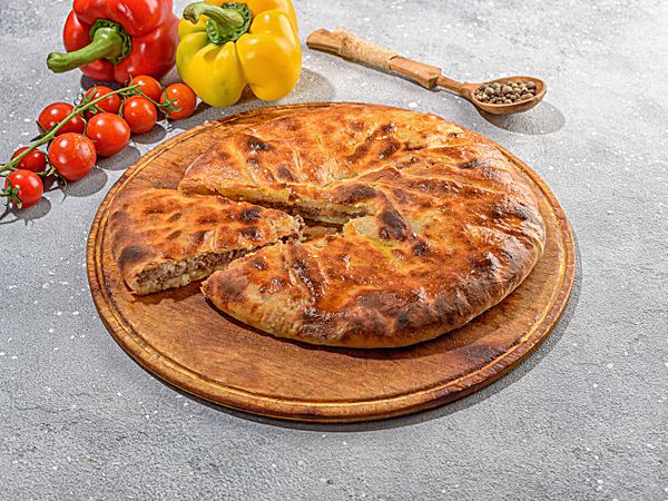 Осетинский пирог с мраморной говядиной и аджикой