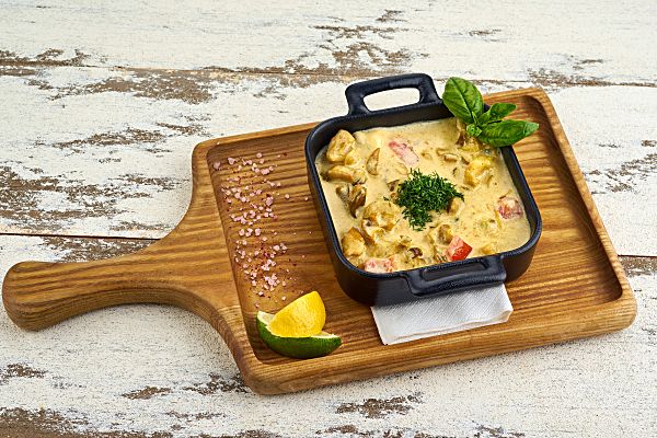 Рапана с томатами в сливочном соусе