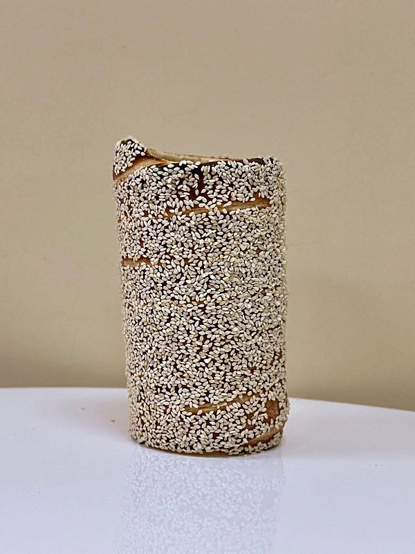 Трдельник с присыпкой кунжута