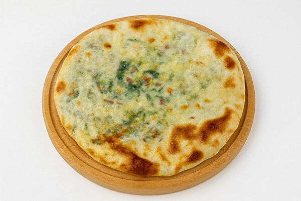 Осетинский пирог с сыром и зеленью